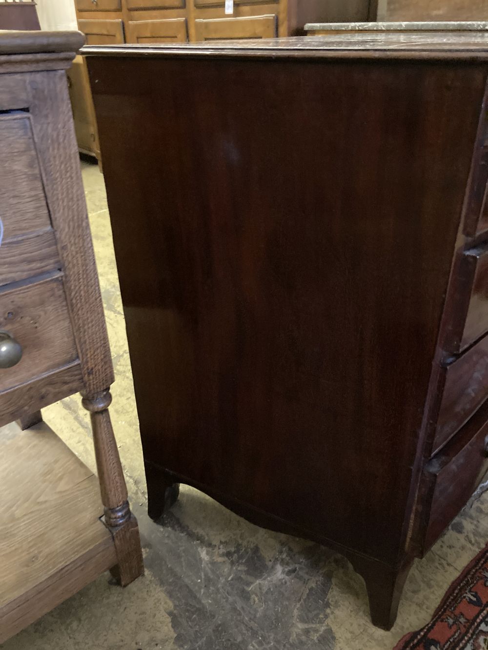 A Regency mahogany bowfront chest with brushing slide, width 100cm, depth 58cm, height 86cm